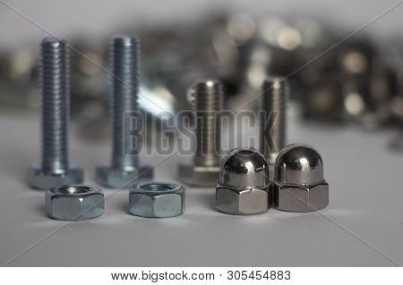 Two Nuts And Two Deaf Nuts. Cap Nuts, Four Bolts On The Back Plate And A Mountain Of Nuts And Bolts.