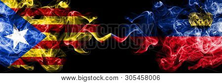 Catalonia Vs Liechtenstein, Liechtensteins Smoke Flags Placed Side By Side. Thick Colored Silky Smok