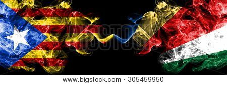 Catalonia Vs Seychelles, Seychelloise Smoke Flags Placed Side By Side. Thick Colored Silky Smoke Fla