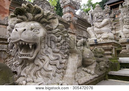 View Of Some Beautiful Stone Statue Lined In Front Of The Pura Dalem Temple In Ubud, Bali, Indonesia