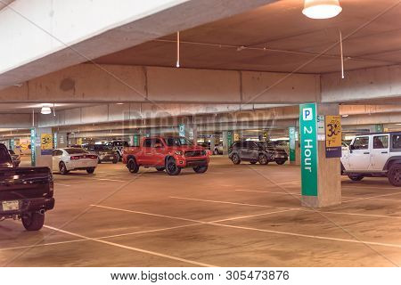 Overhead Green Or Led Indicators Showing Available Parking Spaces At Modern Garage