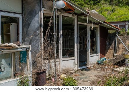Okcheon, South Korea; May 6, 2019: Exterior Of Business At Fishing Resort That Has Been Abandoned Af