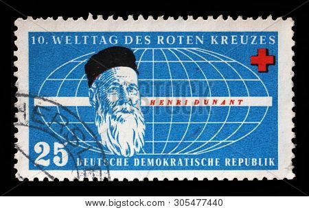 ZAGREB, CROATIA - JULY 03, 2014: A stamp issued in Germany - Democratic Republic (DDR) shows Henri Dunant, Red Cross World Day, circa 1957.