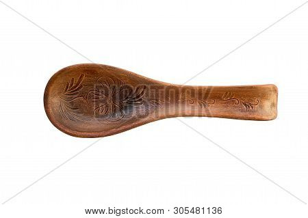 Object One Large Red Ceramic Spoon Is Presented On A White Background. Large Clay Spoon With Rest Or