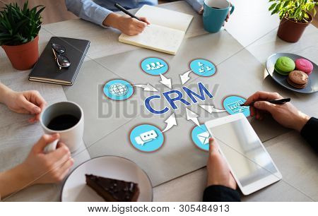 Crm Customer Relationship Management Concept On Office Desktop.