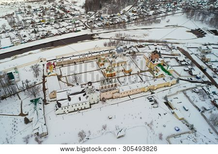 View From Big Height On The Old Tikhvinsky Uspensky Monastery In The Cloudy March Afternoon (aerial 