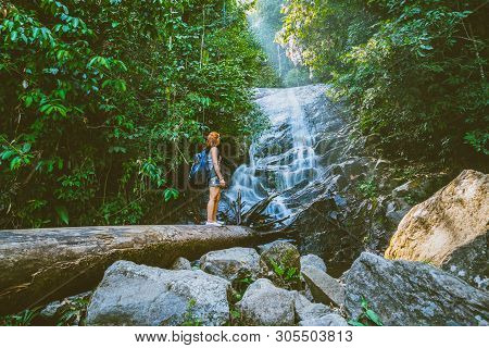 Women Travel. Woman Asia Travelers Travel Nature Forests, Mountains, Waterfalls. Travel Siliphum Wat