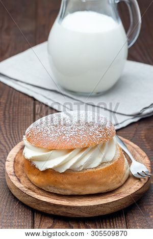 Traditional Swedish Dessert Semla, Also Called Shrove Bun, With Almond Paste And Whipped Cream Filli