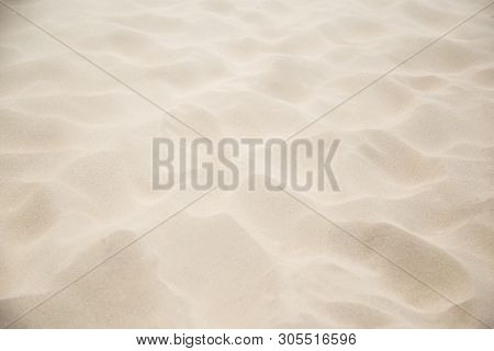 Fine Beach Sand In The Summerbackground With Copy Space And Visible Sand Texture.