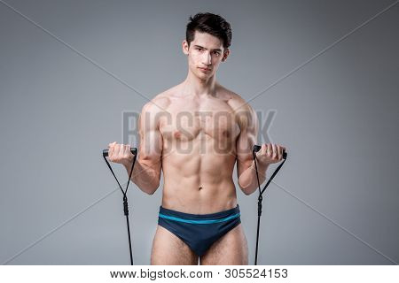 Studio Portrait Young Caucasian Man On Gray Background Posing. Theme Of Puberty, Problem Skin, Teen 