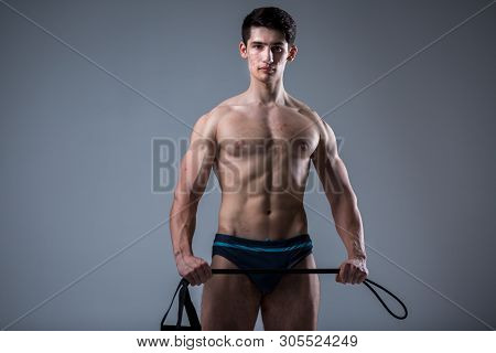 Studio Portrait Young Caucasian Man On Gray Background Posing. Theme Of Puberty, Problem Skin, Teen 