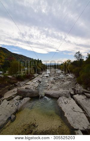 View Of The Fast Mountain River With Water, Stones In The Cherek Gorge In The Mountains Of The North