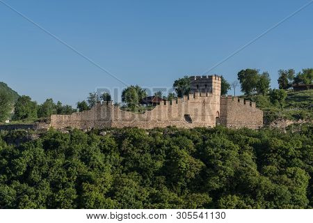 View To Tower And Walls Of Medieval Trapezitsa Fortress,
Veliko Tarnovo In Bulgaria.
