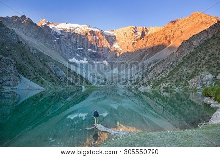Beautiful serene lake in  Fanns mountains (branch of Pamir) in Tajikistan.
