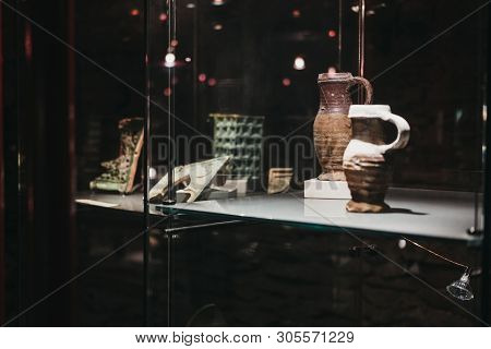 Vianden, Luxembourg - May 18, 2019: Exhibits On Display In A Glass Case Inside Vianden Castle, Luxem