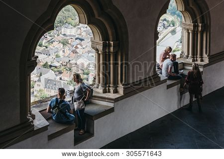 Vianden, Luxembourg - May 18, 2019: People Admiring The Views From The Windows In Vianden Castle, Lu