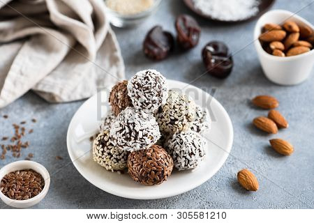 Chocolate Protein Truffles Or Vegan Candy Or Energy Balls With Seeds, Dates And Nuts