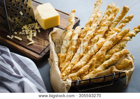 Cheese Stick. Breadsticks With Cheese On Dark Background, Concept For Snack Or Party Time