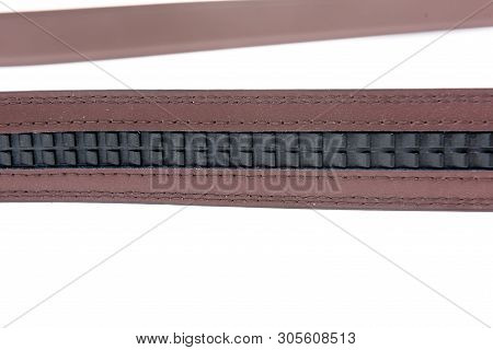 A Belt Witout Belt Holes And Uses Mico Adjustable Ratchet System To Keep The Buckle In Place.