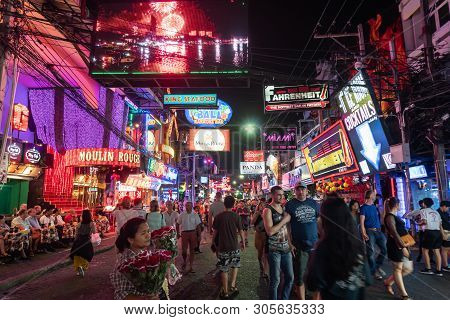 Pattaya, Thailand - March 06, 2019: Crowd Of People Enjoy Night Life At Walking Street In Pattaya, T