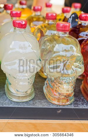 Set Of Wine And Brandy Bottles. Isolated Onbackground