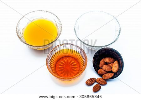 Natural Ex-foliating Face Mask Isolated On White In A Glass Bowl I.e. Raw Milk Well Mixed With Honey