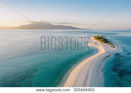 Epic Aerial View Of Tropical Island At Sunset