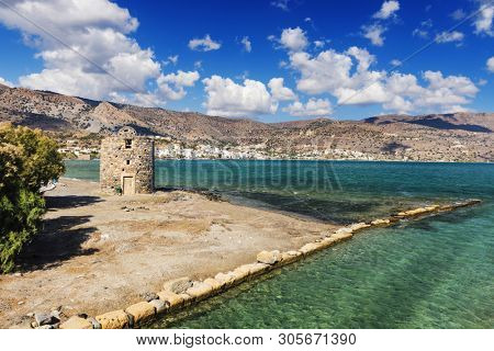 Old Windmills Poros Elounda at Spinalonga Peninsula near the town of Elounda, Island of Crete - Greece