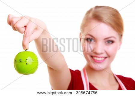 Happy Housewife Or Chef In Colorful Kitchen Showing Apple Timer Eggtimer Isolated Studio Shot