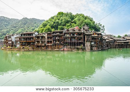 Old Traditional Houses On Riverside Landscape In Fenghuang Ancient Phoenix Town In Hunan China