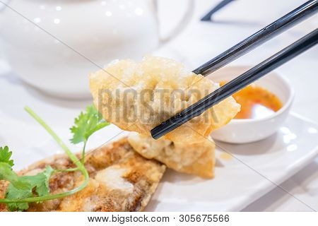 Delicious Dim Sum, Famous Cantonese Food In Asia - Fried Fish And Dumplings With Lemon, Sauce And Te