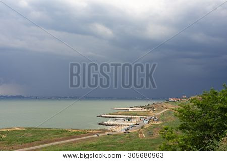 Storm Clouds Over The Sea And The City.coastal Village Liski. Odessa Region. Ukraine.