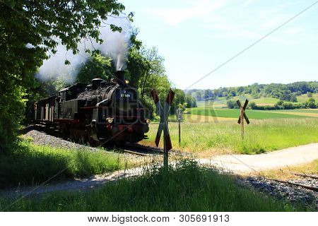 Steam Locomotive On The Way On The Strohgaeubahn Near Weissach In The Heckengaeu