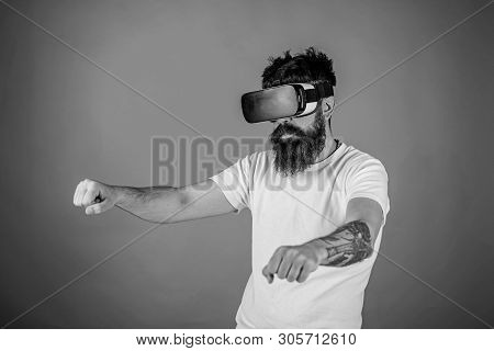 Virtual Racing Concept. Hipster On Confident Face Driving Bike On High Speed In Virtual Reality. Man