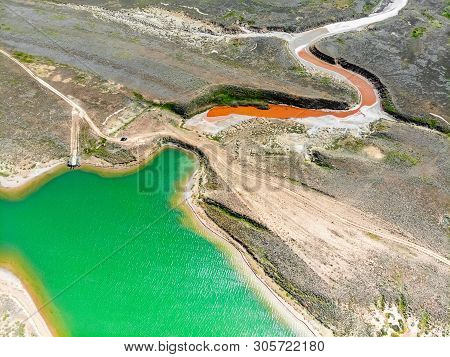 Amazing Aerial View Of Small Red Water River And Green Water Lake In Baskunchak