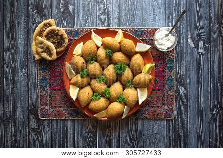 Arabic Meat Appetizer Kibbeh. Traditional Arabic Kibbeh With Lamb And Pine Nuts.