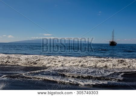 Beautiful And Quiet Beach Masca. Pirate Ship Coming To The Island.. Volcanic Island. Mountains Of Th