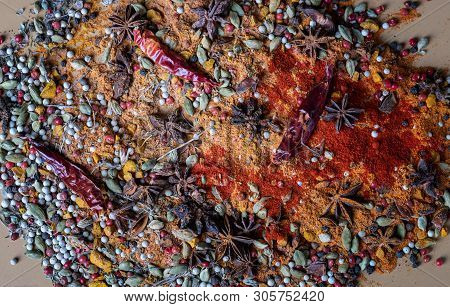 Variety Of Spices And Herbs Of Exotic Indian Colors, On The Kitchen Table