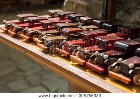 Souvenirs From Lagich. Wooden Toys, Retro Old Cars. Sale Of Souvenirs For Tourists.