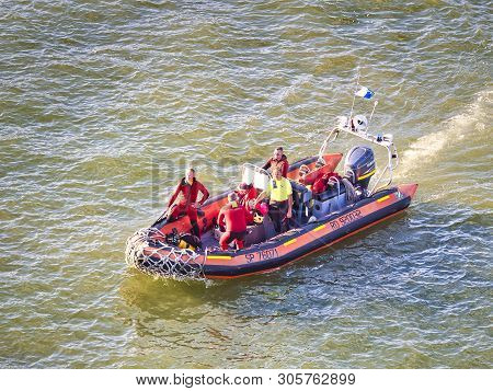 Rouen, France - June 8, 2019. Unidentified Rescue Team On A Inflatable Boat During Armada, Intenatio