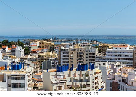 Aerial. The Southern City Of Portugal Faro View From The Top.