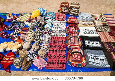 Traditional handcrafts on the market in main street of Uyuni,  Bolivia.