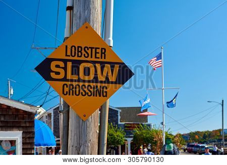 Lobster Crossing Slow fun sign at Perkins Cove, Ogunquit, Maine, USA