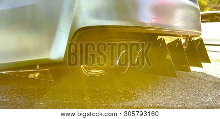 Customized Car With Dual Exhaust And Tail Spikes