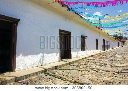 Colorful Colonial Cobblestone Street With Old Houses In Guane, Colombia