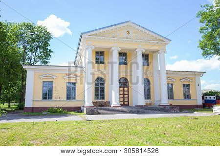 City Jelgava, Latvian Republic. Old Yellow Manor Houses And Garden. Jun 9. 2019. Travel Photo.