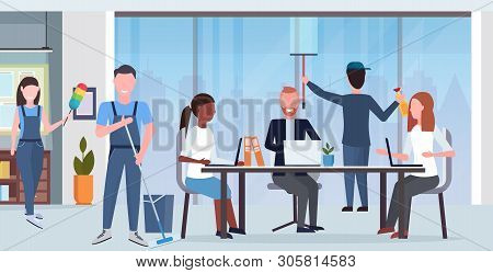 Janitors Team Cleaners In Uniform Working Together With Professional Equipment Cleaning Service Conc