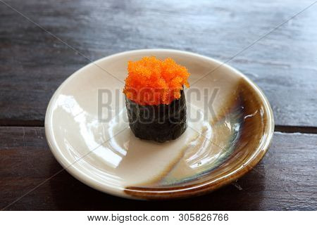 Ebiko Sushi On A Plate In Closeup