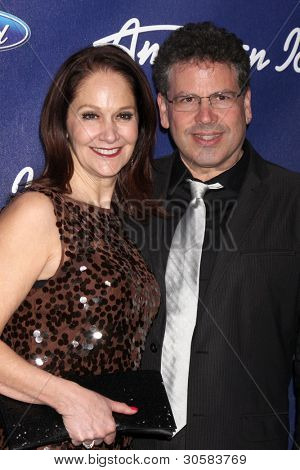 LOS ANGELES - MAR 1:  Peisha McPhee; Michael Orland arrives at the American Idol Season 11 Top 13 Party at the The Grove Parking Structure Rooftop on March 1, 2012 in Los Angeles, CA