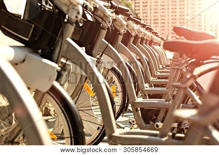 Bicycles That Abreast Waiting For People To Travel Around The City